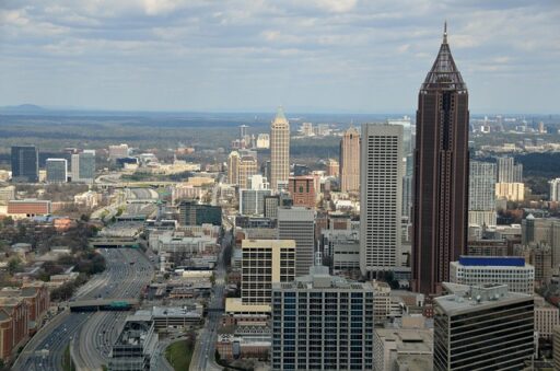 ATL to Midtown Atlanta: Uber Black XL vs. Private Chauffeur SUV for LATAM Guests